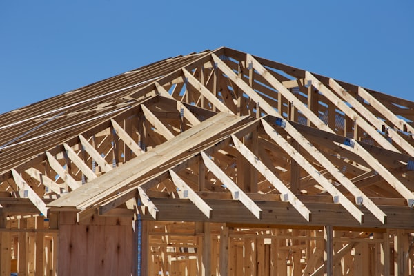 New home under construction with wood framing